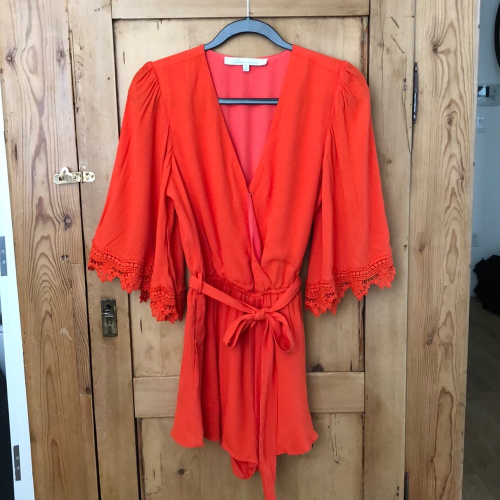 Lovers + Friends bright coral/red romper